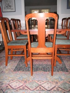 Fine hand crafted wood dining table and chairs by Robert Jarry