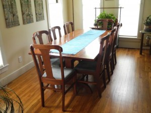 Fine hand crafted wood dining table and chairsby Robert Jarry